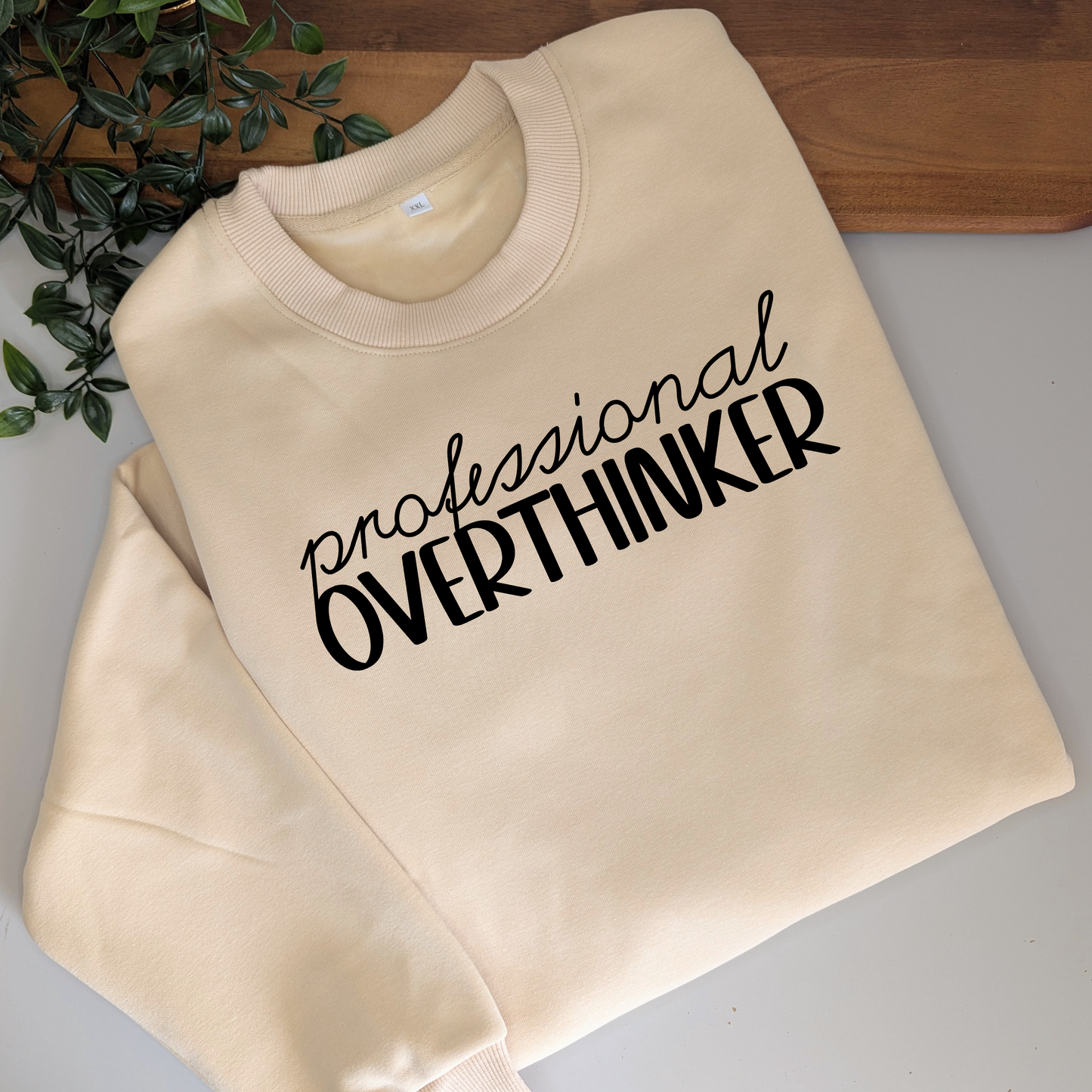 Professional Overthinker womens crewneck jumper. Indigo blue fleece jumper with white decal