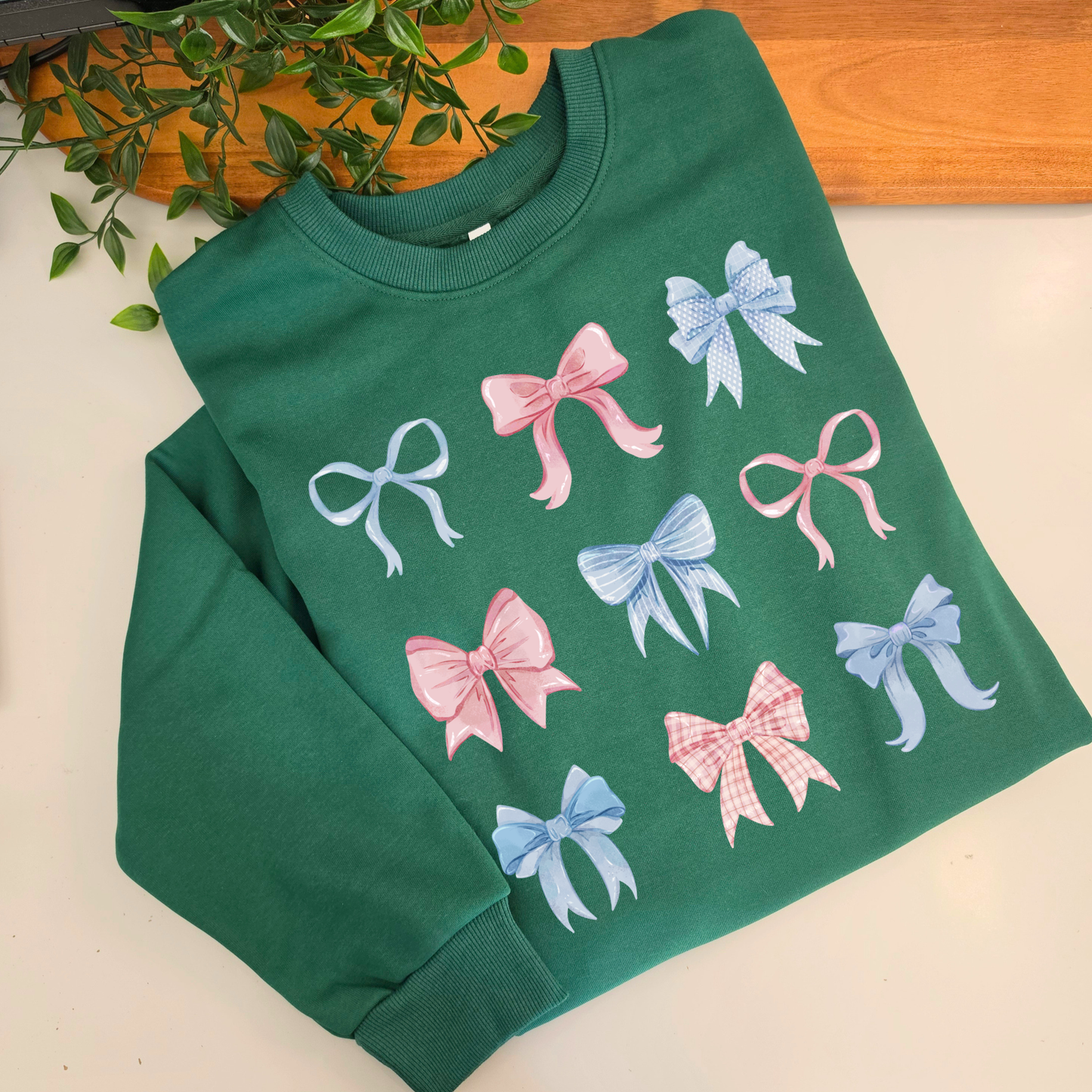 Pastel watercolour bows cute fleece women's jumper. Soft fleece want jumper. Denim Blue or cream jumper. Girly bows.