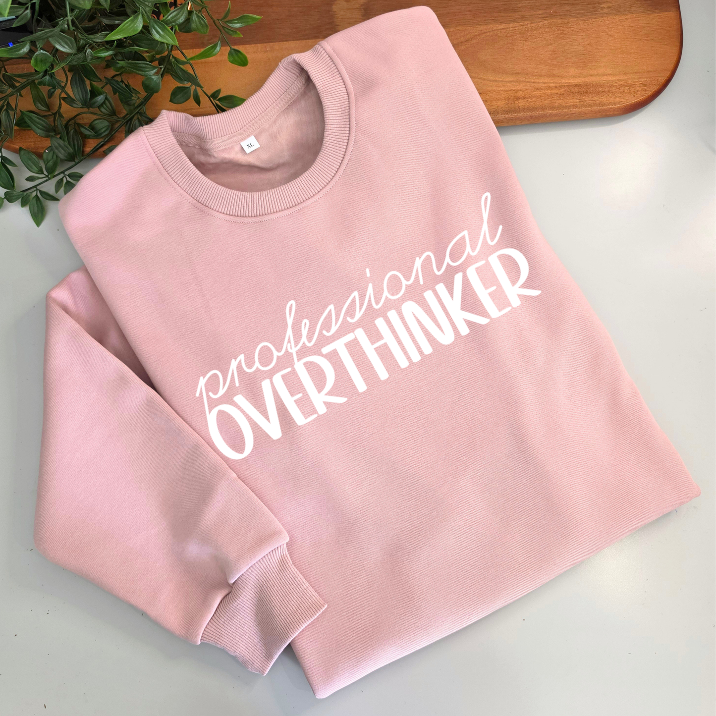 Professional Overthinker womens crewneck jumper. Indigo blue fleece jumper with white decal
