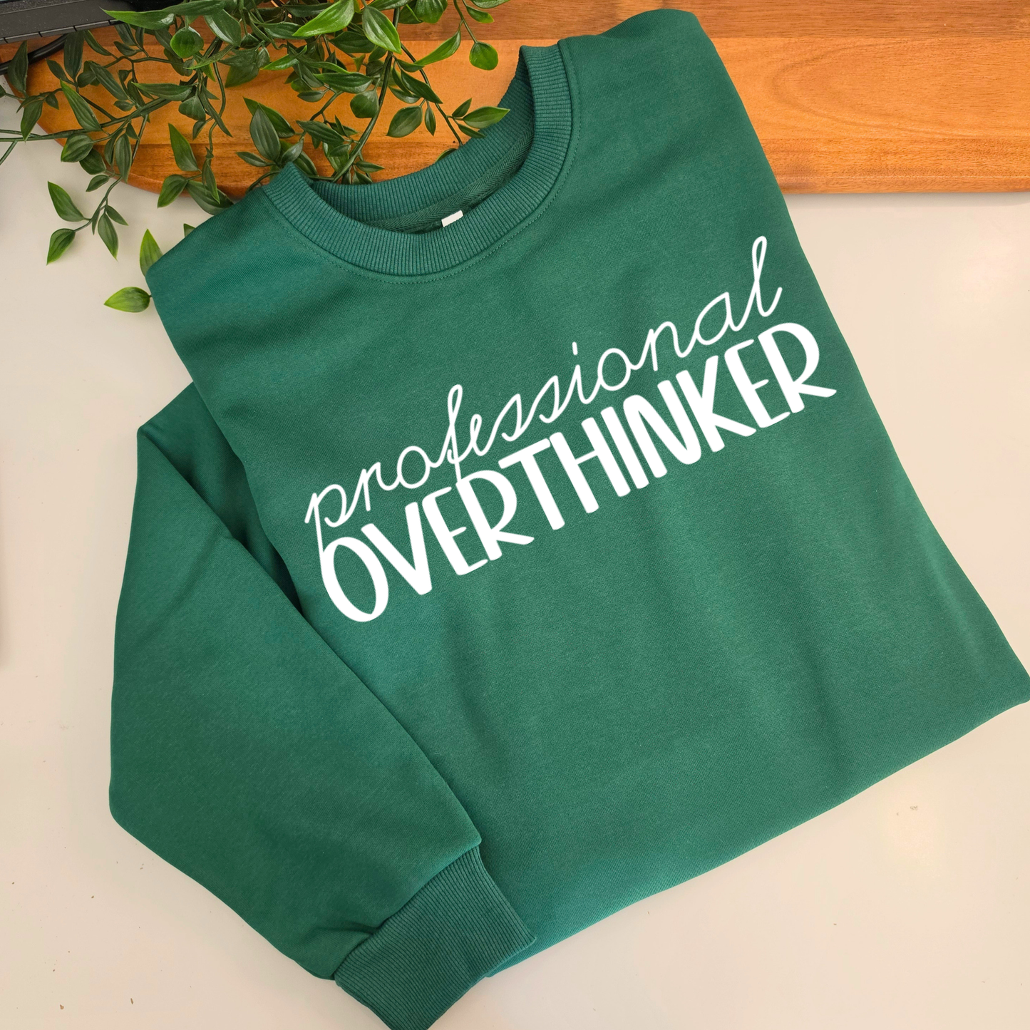 Professional Overthinker womens crewneck jumper. Indigo blue fleece jumper with white decal